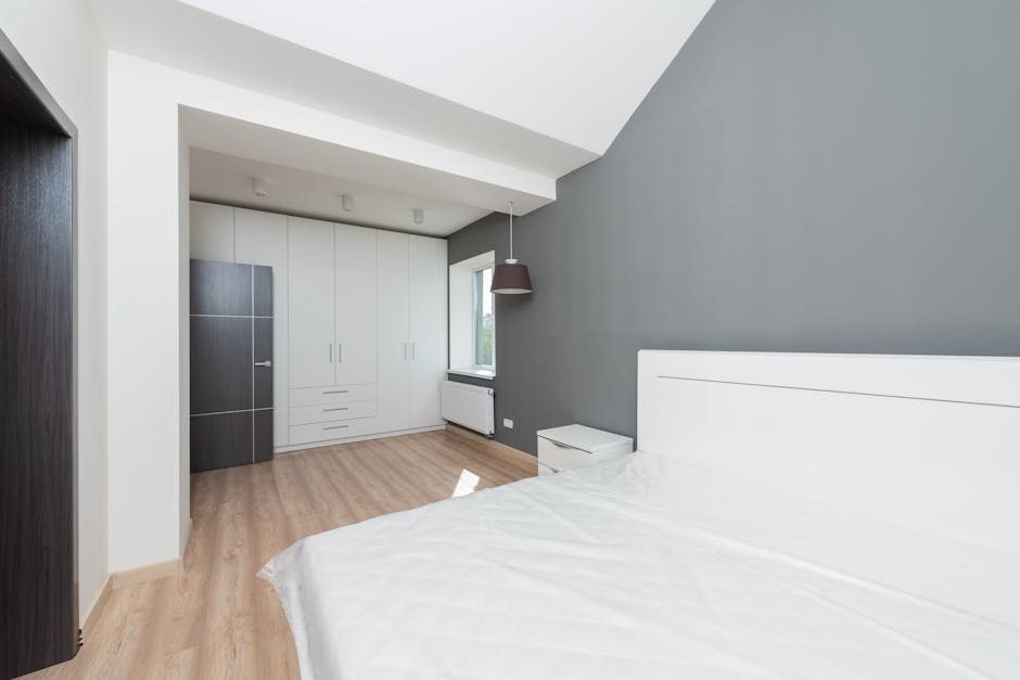 Custom-designed sliding wardrobe with elegant finish and modern handles